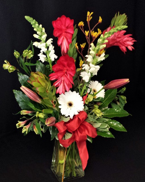 ginger display in rectangular vase tropical flowers for delivery