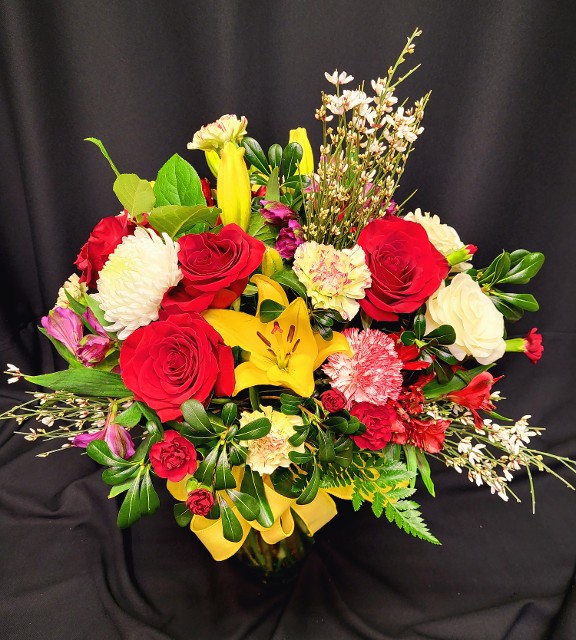 Big full and beautiful bouquet of open showy flowers